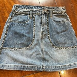 Denim Blank NYC jean skirt with metal detail trim. Size 24, soft and comfy